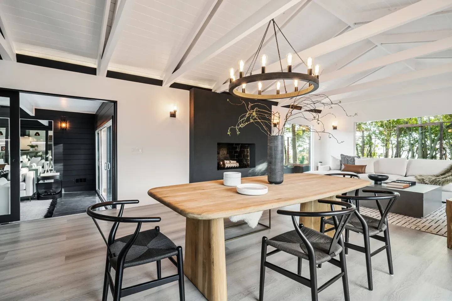 Dining room with vaulted ceilings and round chandelier