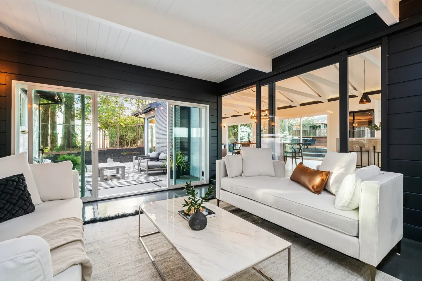 Modern living room with black and white aesthetic and open concept