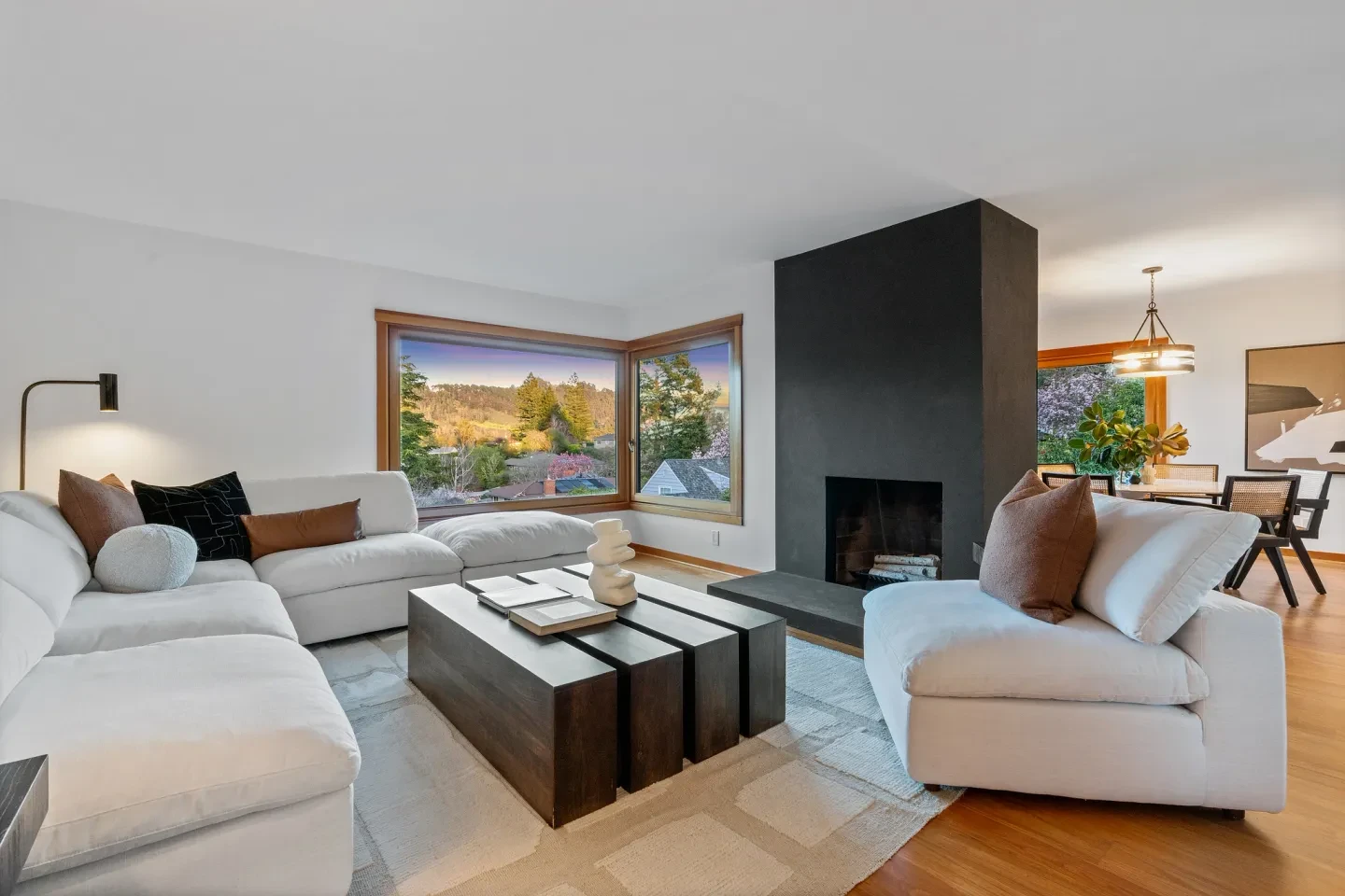 Modern living room with natural wood accents and fireplace